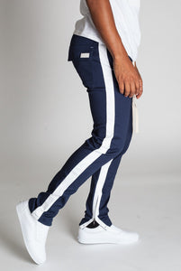 STRIPED ANKLE ZIP PANTS